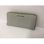 MICHAEL KORS - a light grey purse