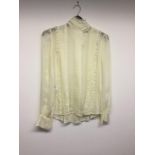 ALEXANDER McQUEEN - a ladies cream blouse, size 14