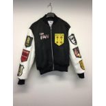 THE FAN - a ladies black jacket with white sleeves, size small