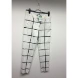 SPORTMAX - a pair of ladies white and black checked trousers, size 10