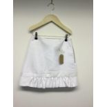 CAITLIN PRICE - a ladies white skirt, size small