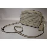 MICHAEL KORS - Grey small shoulder / cross body bag with cut out star design to front panel