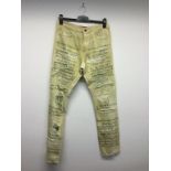 WHO DECIDES WAR - a pair of ladies cream jeans, size 32