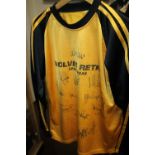 A SIGNED WOLVES FOOTBALL SHIRT TO INCLUDE SIGNATURES FOR MATT MURRAY, ETC.