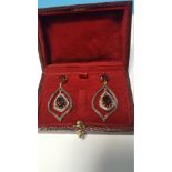 A PAIR OF DROP EARRINGS STAMPED 585 AND 925 SET WITH GARNETS AND DIAMONDS, BOXED