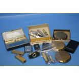 A TIN OF COLLECTABLES TO INCLUDE LIGHTERS, COMPACTS, PENKNIVES ETC.