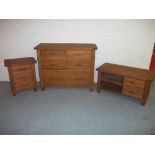 AN OAK FIVE DRAWER CHEST OF DRAWERS (TWO OVER TWO OVER ONE), AN OAK MEDIA UNIT AND AN OAK THREE