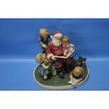 A HUMMEL FIGURE GROUP 'STORY TIME WITH SANTA'