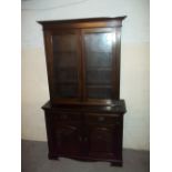 AN ANTIQUE DARK WOOD CARVED WALL UNIT WITH LOCKS, W 123 CM, H 214 CM