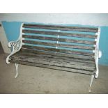 A CAST IRON GARDEN BENCH