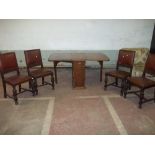 A 1920S DROP LEAF STORAGE TABLE AND FOUR CHAIRS IN OAK