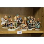 A COLLECTION OF HUMMEL FIGURES