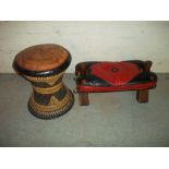 AN ANTIQUE CAMEL STOOL TOGETHER WITH ANOTHER LEATHER TOPPED ROUND STOOL