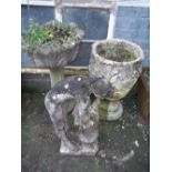 TWO CONCRETE PEDESTAL PLANTERS AND A CONCRETE STATUE