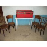 A RED STORAGE TRAVEL TRUNK AND FOUR ANTIQUE DINING CHAIRS