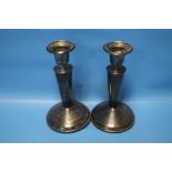 A PAIR OF HALLMARKED SILVER CANDLESTICKS