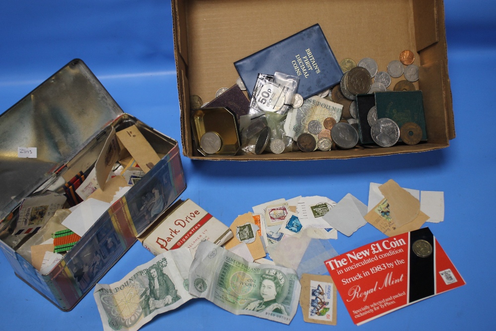 A QUANTITY OF ASSORTED COINS AND STAMPS