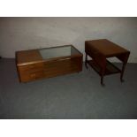 A RETRO TEAK / GLASS COFFEE TABLE AND A TEAK DROPLEAF SERVING TROLLEY