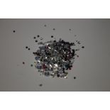 A BAG OF LOOSE MIXED STONES INCLUDING CUBIC ZIRCONIA, RUBY, EMERALD, SAPPHIRE, AMETHYST AND