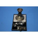 A QUANTITY OF SILVER ITEMS TO INCLUDE A CANDLESTICK, SPOONS, SUGAR TONGS ETC.