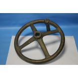 A BRASS/BRONZE FOUR SPOKE FLY WHEEL POSSIBLY FROM A WWI ARTILLERY PIECE D 30.5 cm