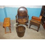 AN ANTIQUE LEATHER CHAIR, A DROPLEAF OAK TABLE, AN OAK STOOL, A WOODEN BUCKET AND A DOLL'S CRADLE (