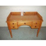 AN ANTIQUE PINE DESK