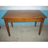 A SOLID OAK DESK WITH TWO DRAWERS