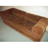 A BROWN SOFA BED