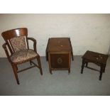 AN ANTIQUE OAK STOOL, AN ANTIQUE OAK CHAIR BY MANOR CABINET WORKS AND AN ANTIQUE OAK DROP LEAF