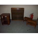 A GLAZED BOOKCASE AND A HALL TABLE WITH TWO MAGAZINE RACKS