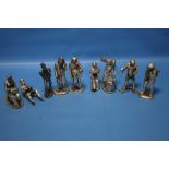 A COLLECTION OF WHITE METAL FIGURES