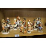 A COLLECTION OF HUMMEL FIGURES