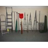 A QUANTITY OF GARDEN TOOLS INCLUDING TWO STEP LADDERS AND STEEL GROWING FRAMES