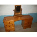 A SOLID PINE TWIN PEDESTAL DRESSING TABLE AND ADDITIONAL SWING MIRROR