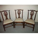 THREE CHIPPENDALE STYLE DINING CHAIRS