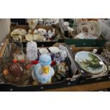 FOUR TRAYS OF CERAMICS TO INCLUDE CONTINENTAL STYLE FIGURES, A FIGURATIVE LAMP ETC.