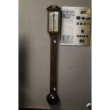 A STICK BAROMETER WITH NAME "A. COMITTI & SON, LONDON"