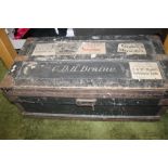 A METAL BOUND WOODEN CHEST