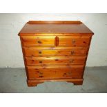 A SOLID PINE DUCAL CHEST OF DRAWERS, TWO OVER THREE