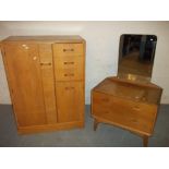 A RETRO G-PLAN OAK TWO PIECE BEDROOM SUITE INCLUDING A TALLBOY AND A DRESSING TABLE