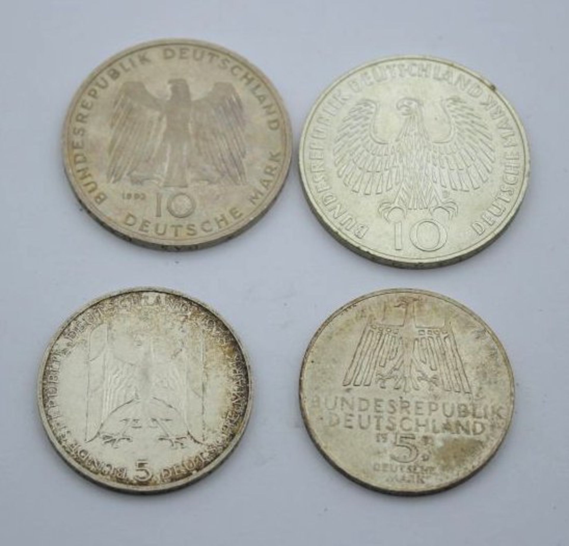 2x 10 DM Münzen 1972 D u. 1993 F sowie 2x 5 DM 1971 D u. 1978 D.
