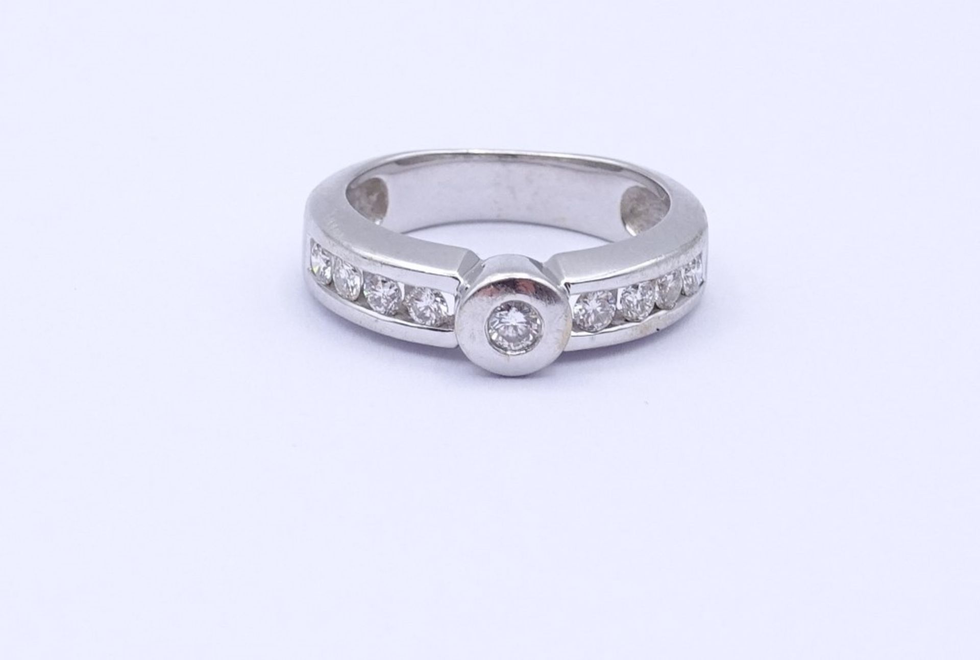 Brillant Ring WG 0.585 Christ 9 Brillanten zus.ca.0,20ct.,4,4gr., RG 48