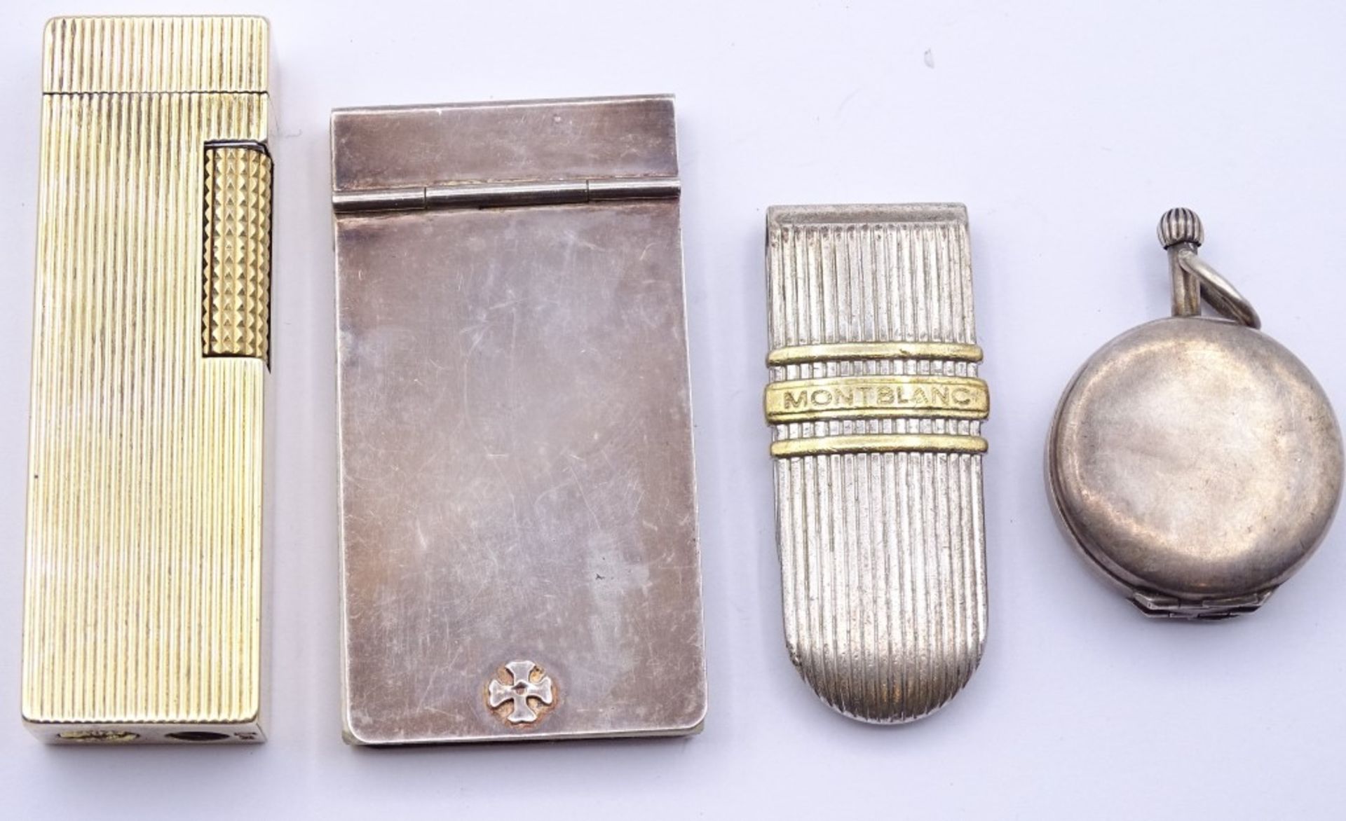 Silber Konvolut:Feuerzeug (925),Fotomedaillon DRGM (900),Notizzettelhalter (versilbert),und Mont