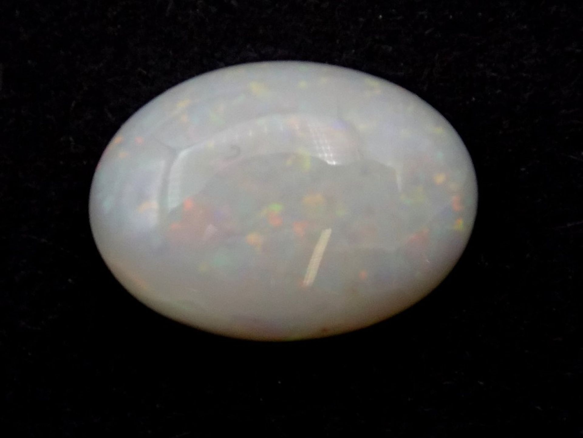 Opal Cabochon 3,75ct.,weiß/rot,,blau und grün,14,2x10,3x4,1 - Bild 7 aus 8