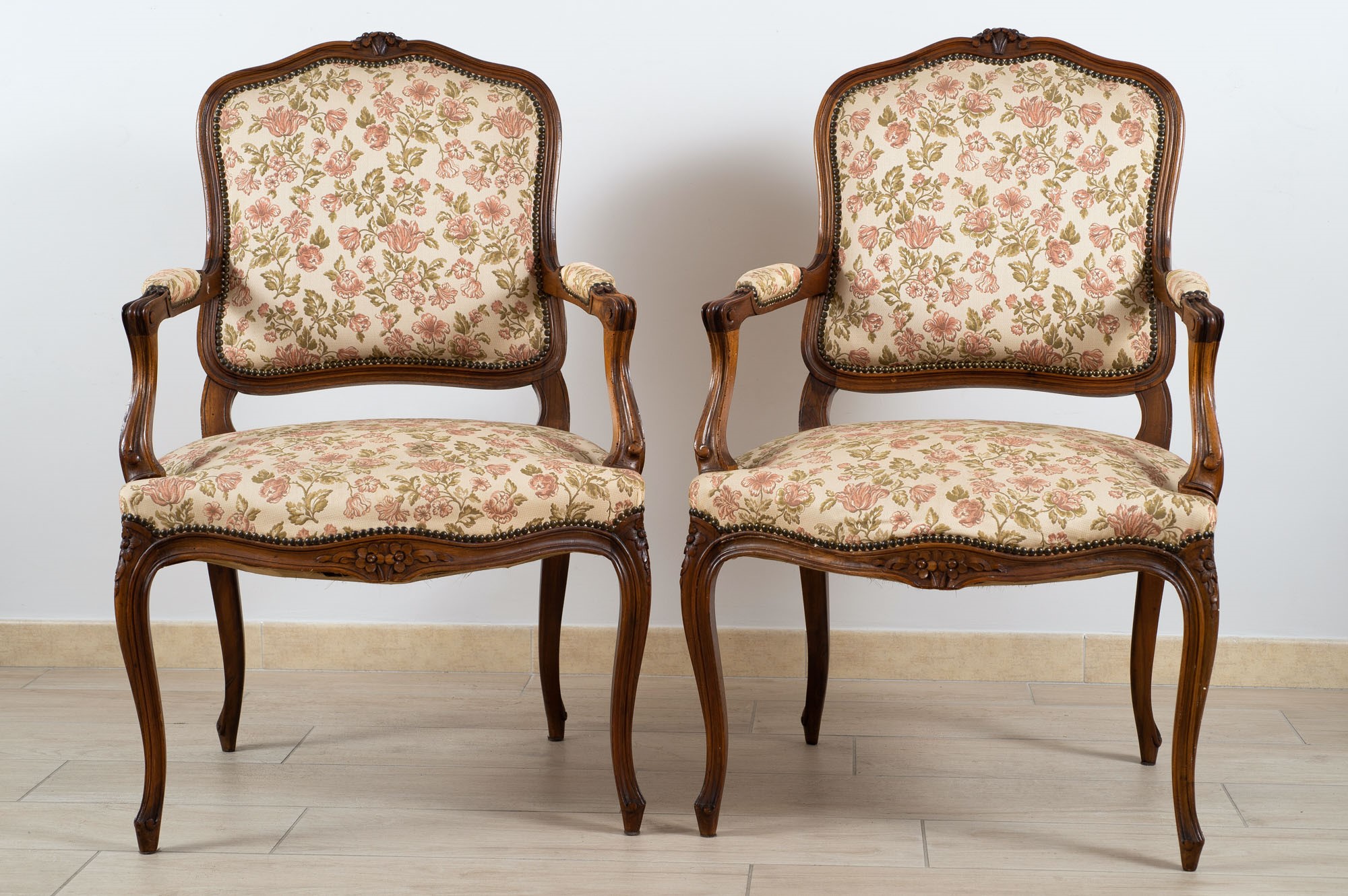 Pair of Louis XV style walnut armchairs