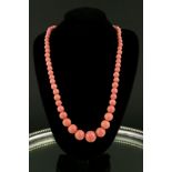 Salmon pink glass necklace with 18 kt gold clasp