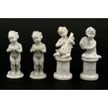 Lot of four white porcelain cherubs