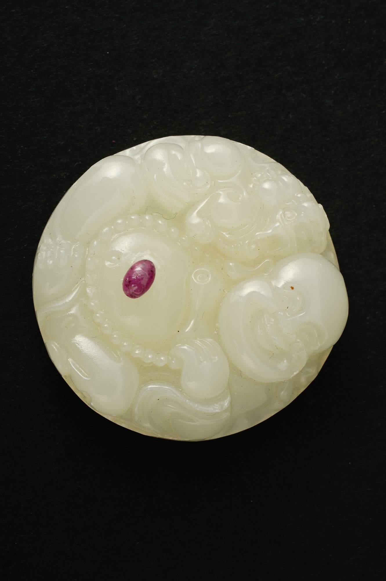 White jade pendant with hard stone application