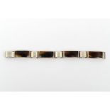 Silver bracelet with tortoise shell elements